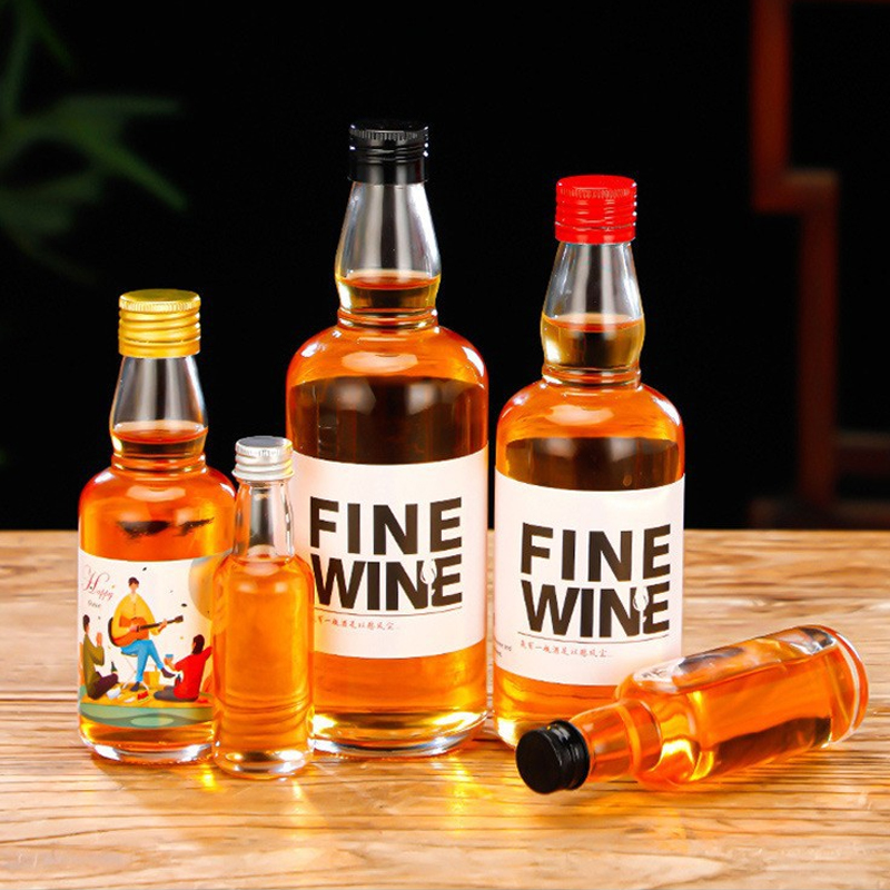 Wholesale Round Glass Tequila Whisky Vodka Bottle 50ml 100ml 200ml 375ml 500ml Liquor Glass Bottle with Screw Cap