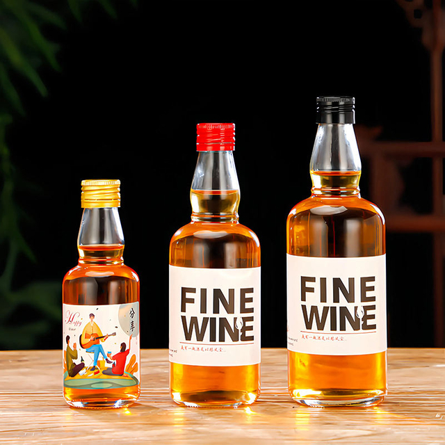 Wholesale Round Glass Tequila Whisky Vodka Bottle 50ml 100ml 200ml 375ml 500ml Liquor Glass Bottle with Screw Cap